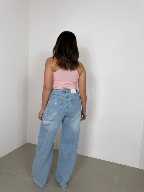 JEANS CON RISVOLTO E STRAPPI