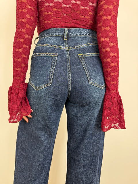 JEANS PALAZZO CON ABBOTONATURA TRASVERSALE