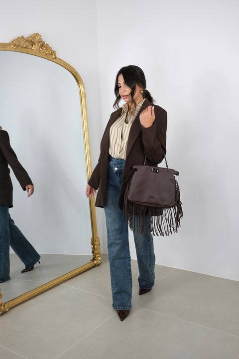 JEANS CON ABBOTTONATURA TRASVERSALE