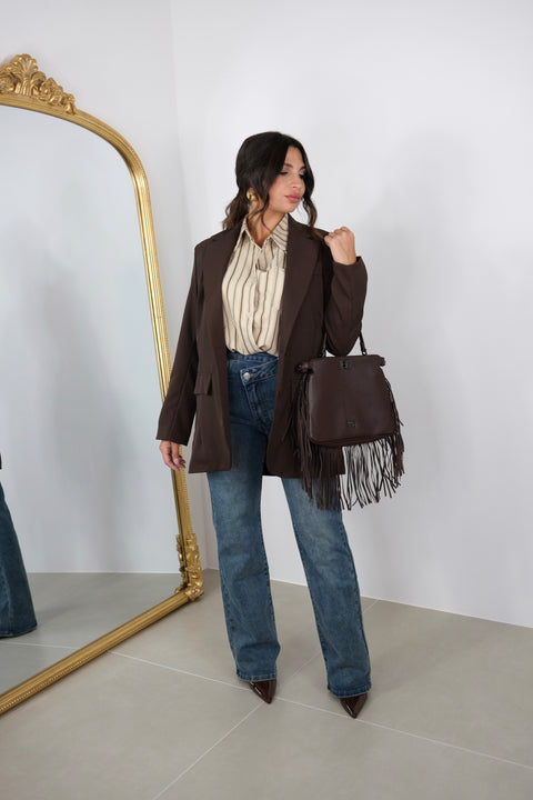 JEANS CON ABBOTTONATURA TRASVERSALE