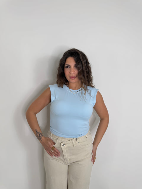 MAGLIA SCOLLO SUL RETRO CELESTE