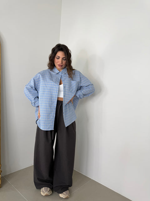 CAMICIA CON SPALLINE CELESTE