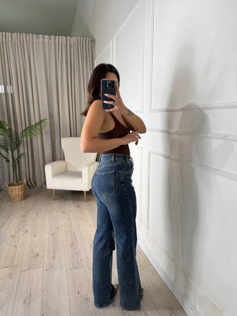 JEANS CON ABBOTTONATURA TRASVERSALE